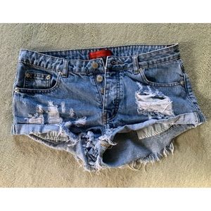 Signature 8 distressed high-rise jean shorts